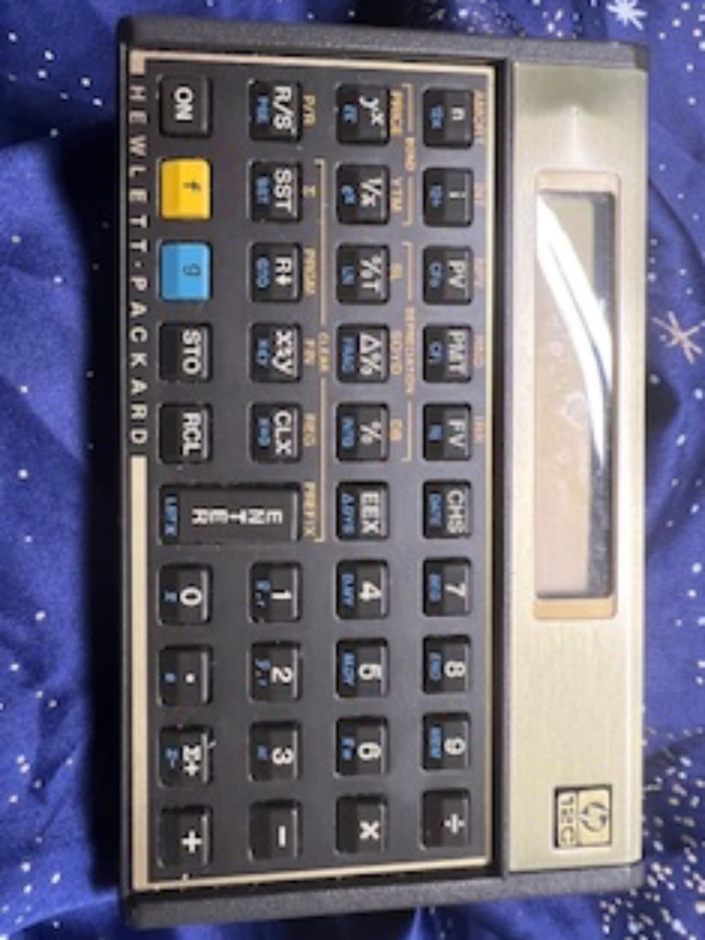 Vintage Hewlett-Packard Financial 12C Calculator.